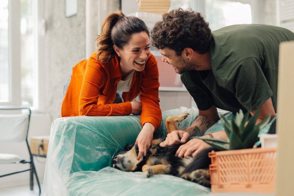 Young couple with their dog
